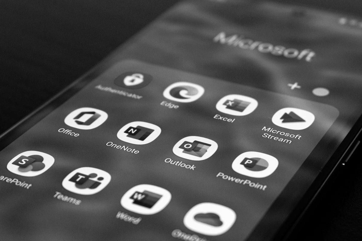 Phone showing Microsoft 365 apps including Outlook